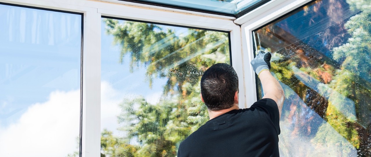 Man cleaning windows